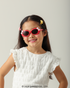 Criança usando Óculos de Sol Infantil Hello Kitty Bubble Vermelho Sanrio