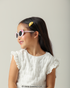 Criança sorrindo com Óculos de Sol Infantil My Melody Bubble Rosa Sanrio visão perfil