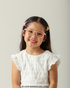 Criança pequena sorrindo com Óculos Infantil My Melody Cotton Rosa