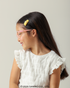 Criança pequena sorrindo com Óculos Infantil My Melody Cotton Rosa vista perfil
