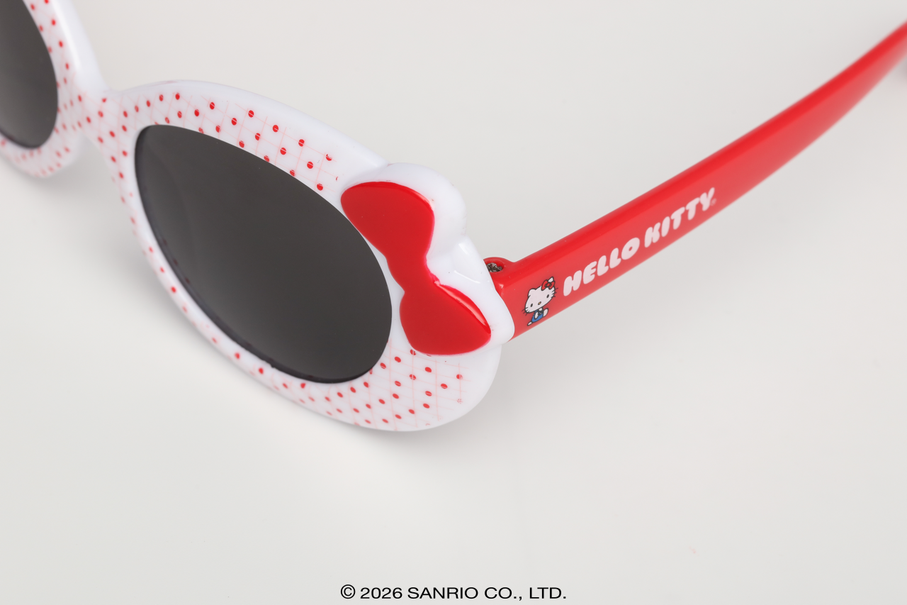 Detalhe do laço decorativo vermelho no Óculos de Sol Infantil Hello Kitty Bubble Branco Sanrio