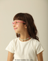 Criança usando Óculos Infantil Hello Kitty Poppy Rosa vista de perfil