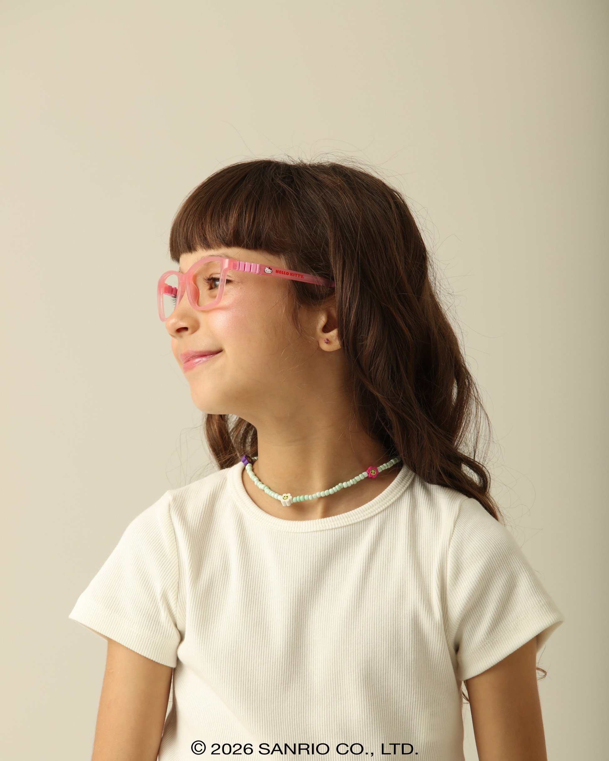 Criança usando Óculos Infantil Hello Kitty Poppy Rosa vista de perfil