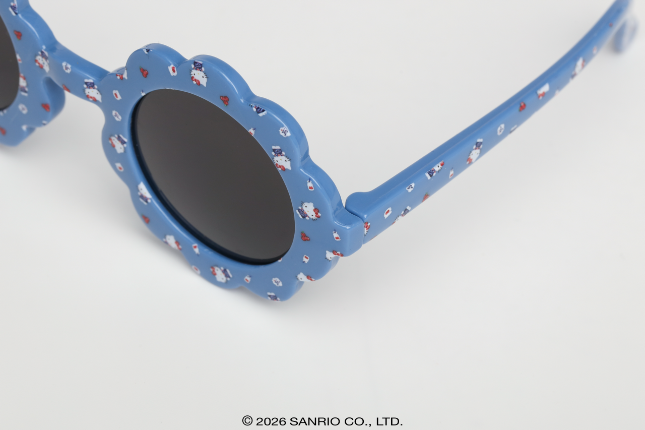 Detalhe da armação em formato floral bege do Óculos Hello Kitty Flower Azul